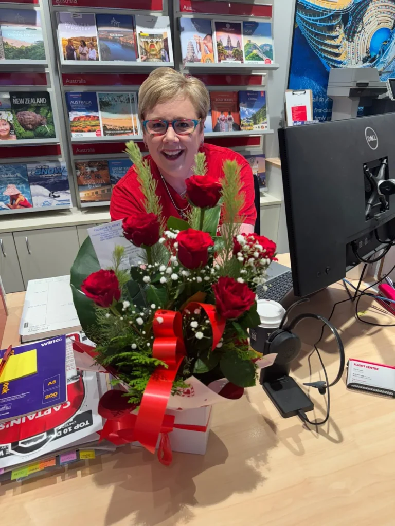Ms Rose Perth florist delivering premium red roses to corporate office in Perth